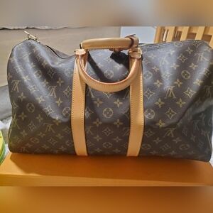 Louis vuitton keep all 45. Comes with luggage tag and dustbag